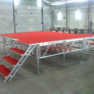 red stage platform outdoor concert stage